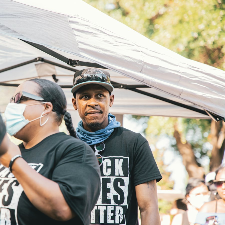 Organizers talking at an outdoor community event
